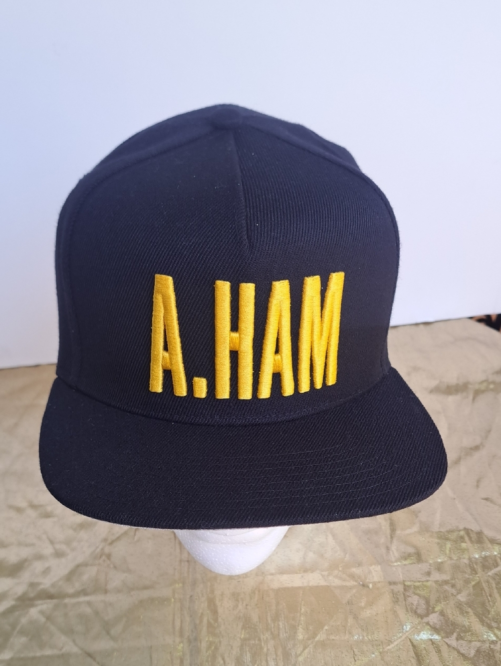 Hamilton Black Snapback Hat with Gold Embroidery